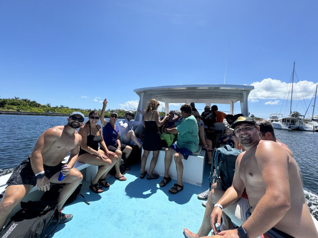 Our group on a private boat chartered at the Grand Cayman port, headed to the stingray sandbar
