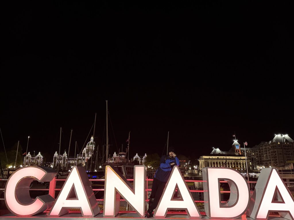 The lit-up CANADA sign on the waterfront in Victoria, British Columbia at night